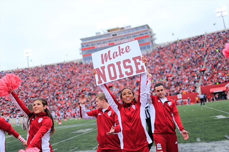 Cheerleaders cheer at an Indiana University football game at Memorial Stadium.